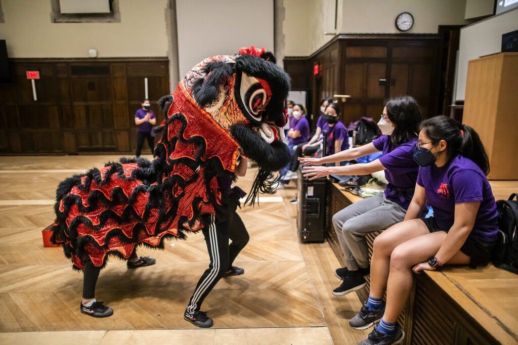 Penn Lion members practicing in the ARCH Auditorium .