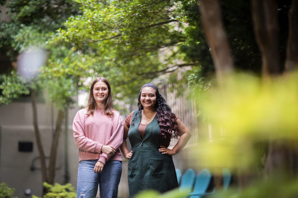Ryly Ziese (left) and Nyair Locklear (right) outside the Greenfield Intercultural Center.