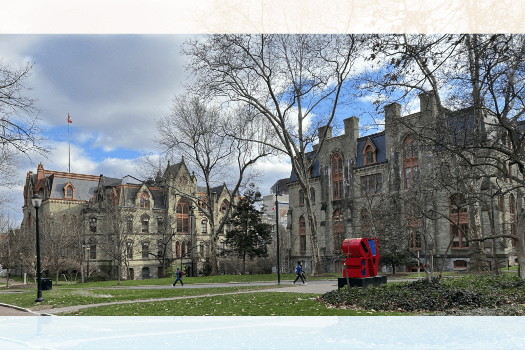 A photo of a wide shot of College Hall set on a decorative background.